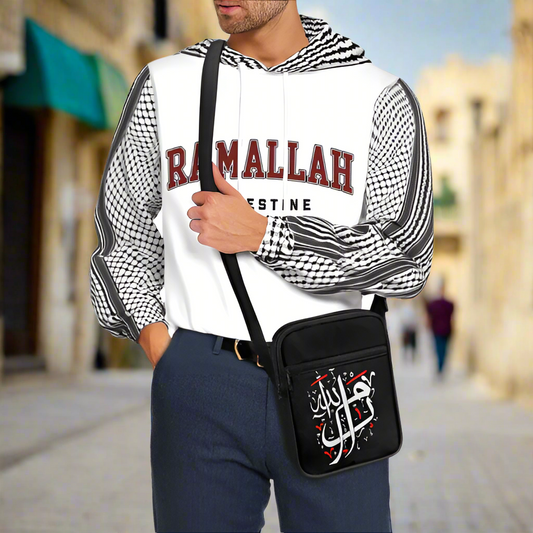 Man wearing a Ramallah Bag with a Ramallah Palestine Sweatshirt with Kuffiyeh Long Sleeves