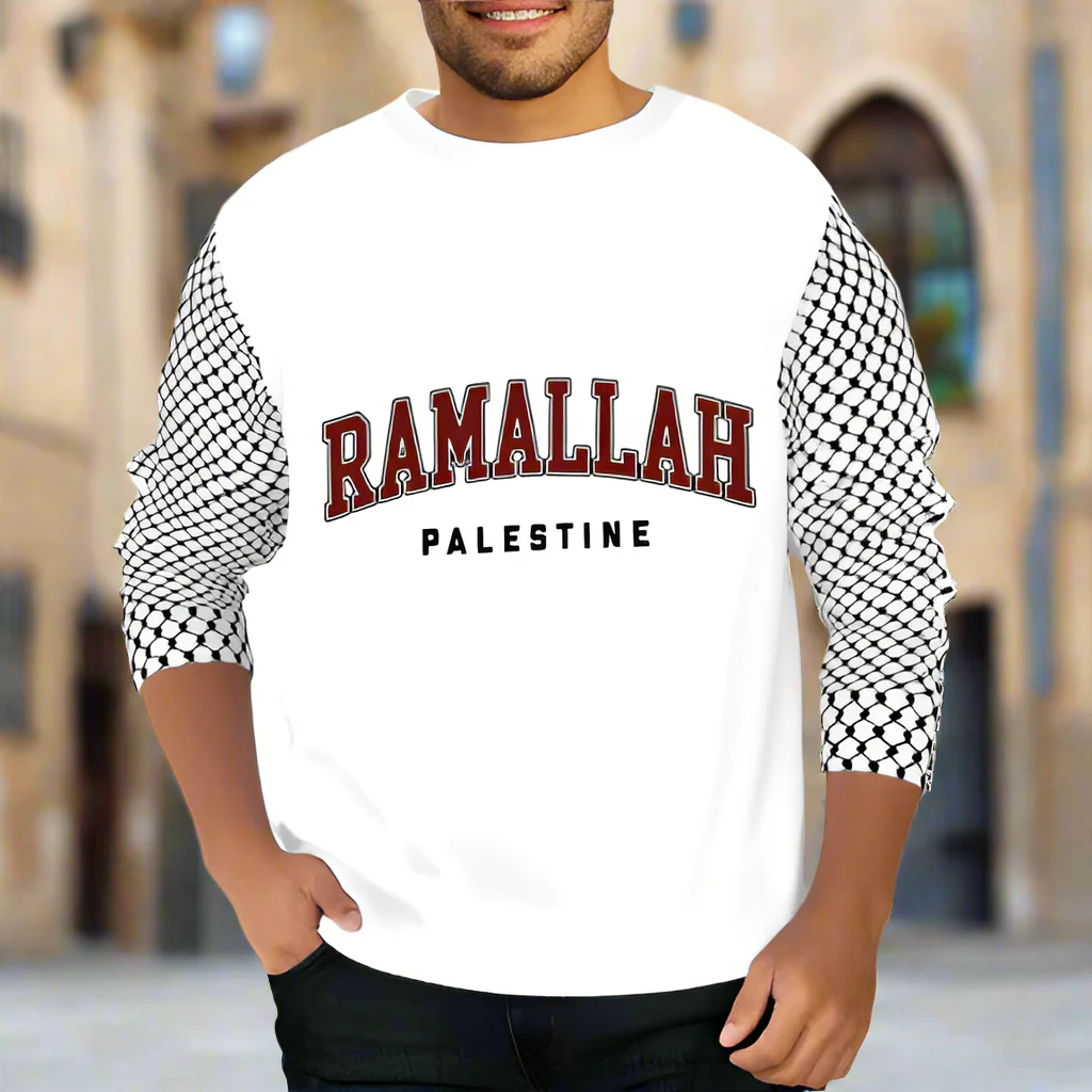 Man wearing a Ramallah Palestine Sweatshirt with Kuffiyeh Long Sleeves