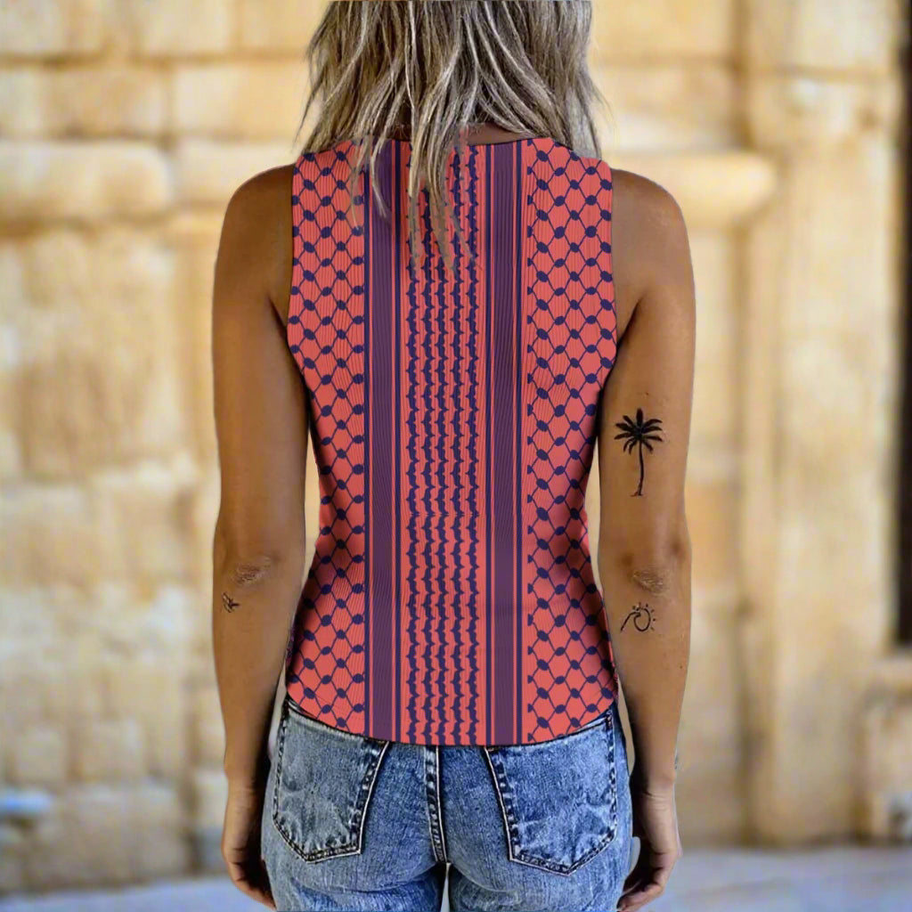 Person wearing a sleeveless patterned keffiyeh  top