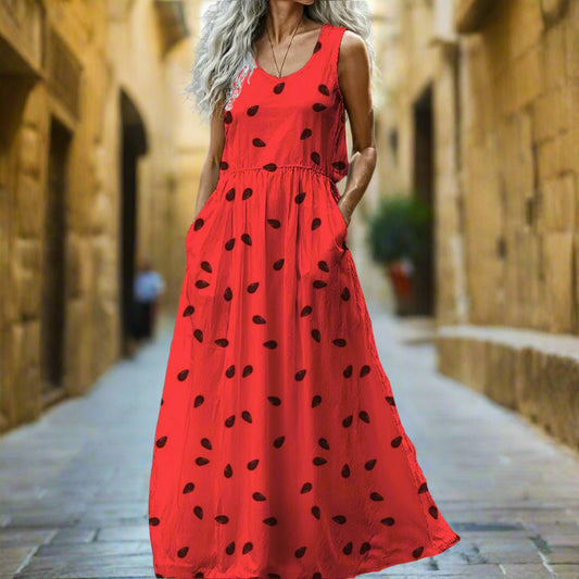 Red watermelon solidarity dress with black patterns on a gray background